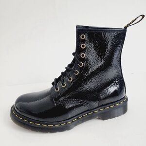 Dr Martens women’s size 9 black patent leather boots.